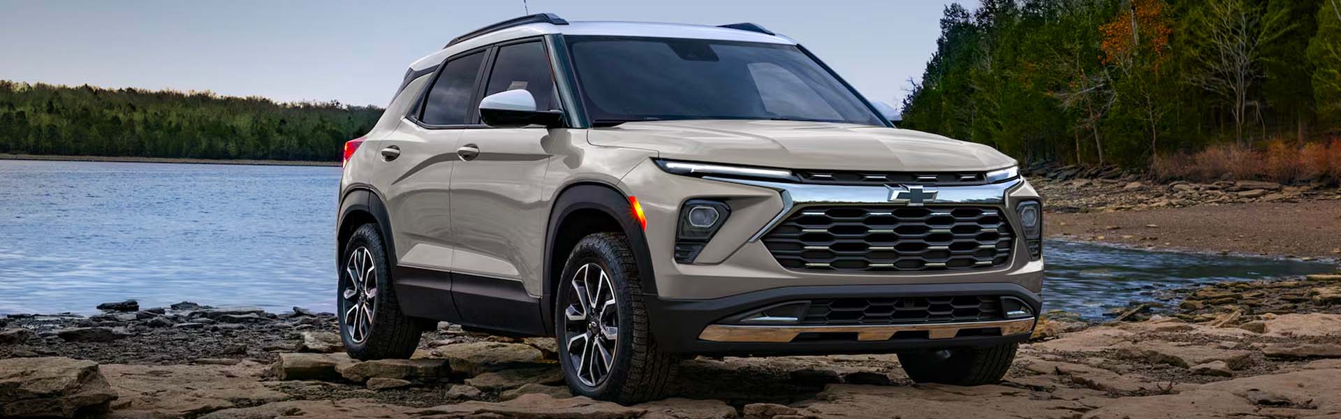 Chevrolet Trailblazer on a rocky lakeside trail.