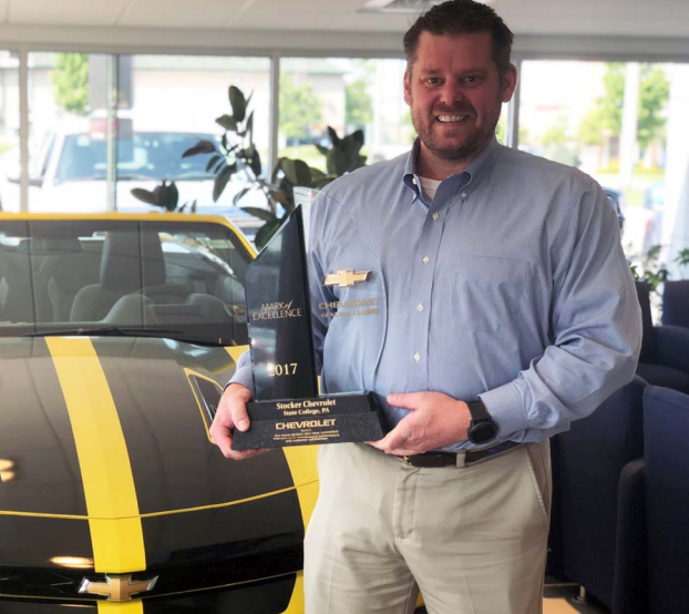 Bob Young with trophy