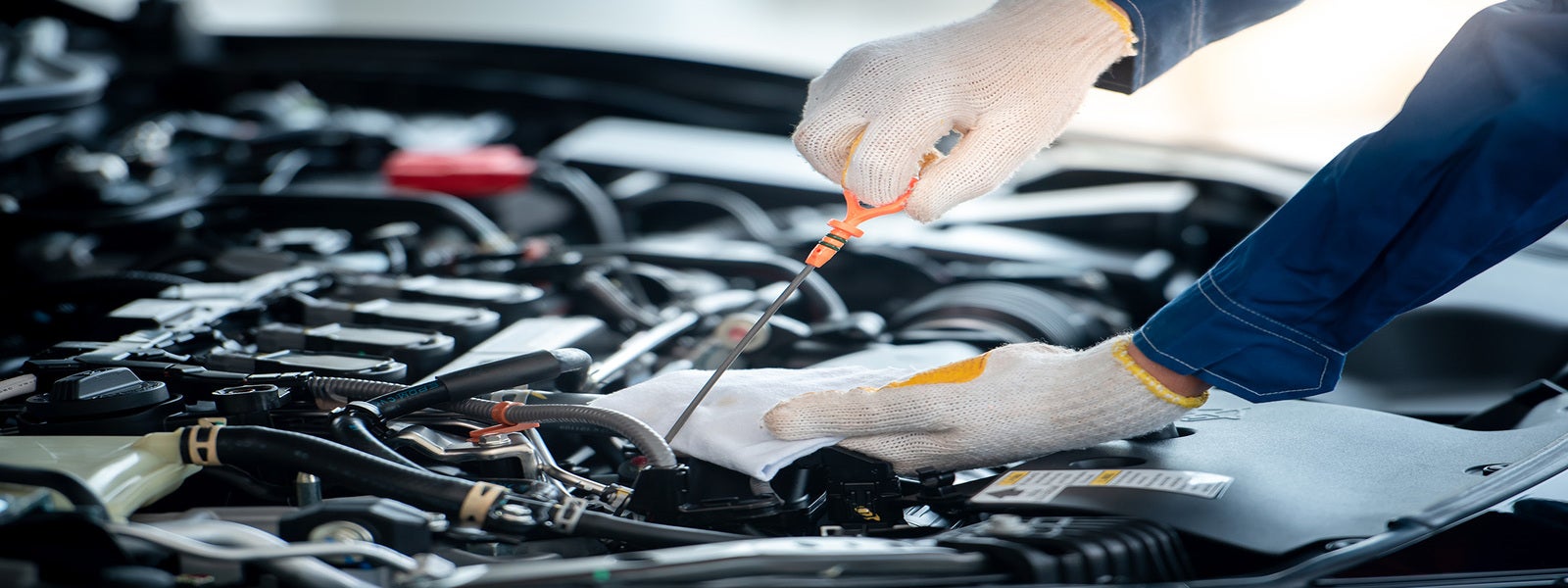 Checking oil in vehicle